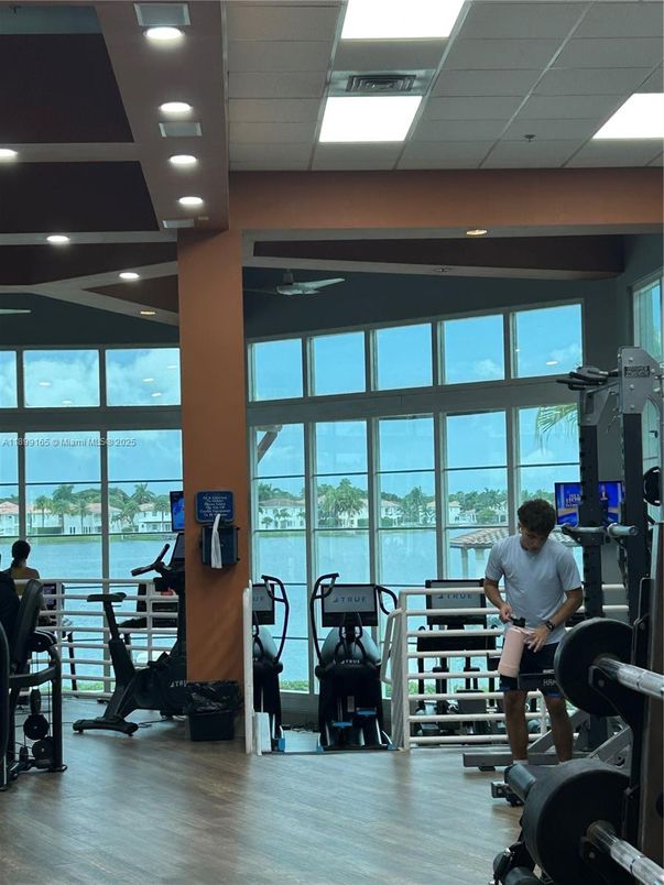 Fitness Equipment, Gym, Interior, Recessed Lighting, Water, Wood Texture Flooring