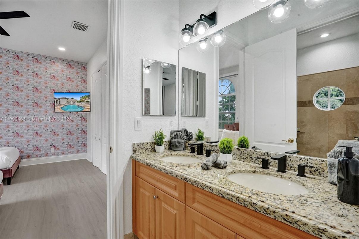 Bathroom, Dual Sink Vanities, Interior, Recessed Lighting, Wood Texture Flooring