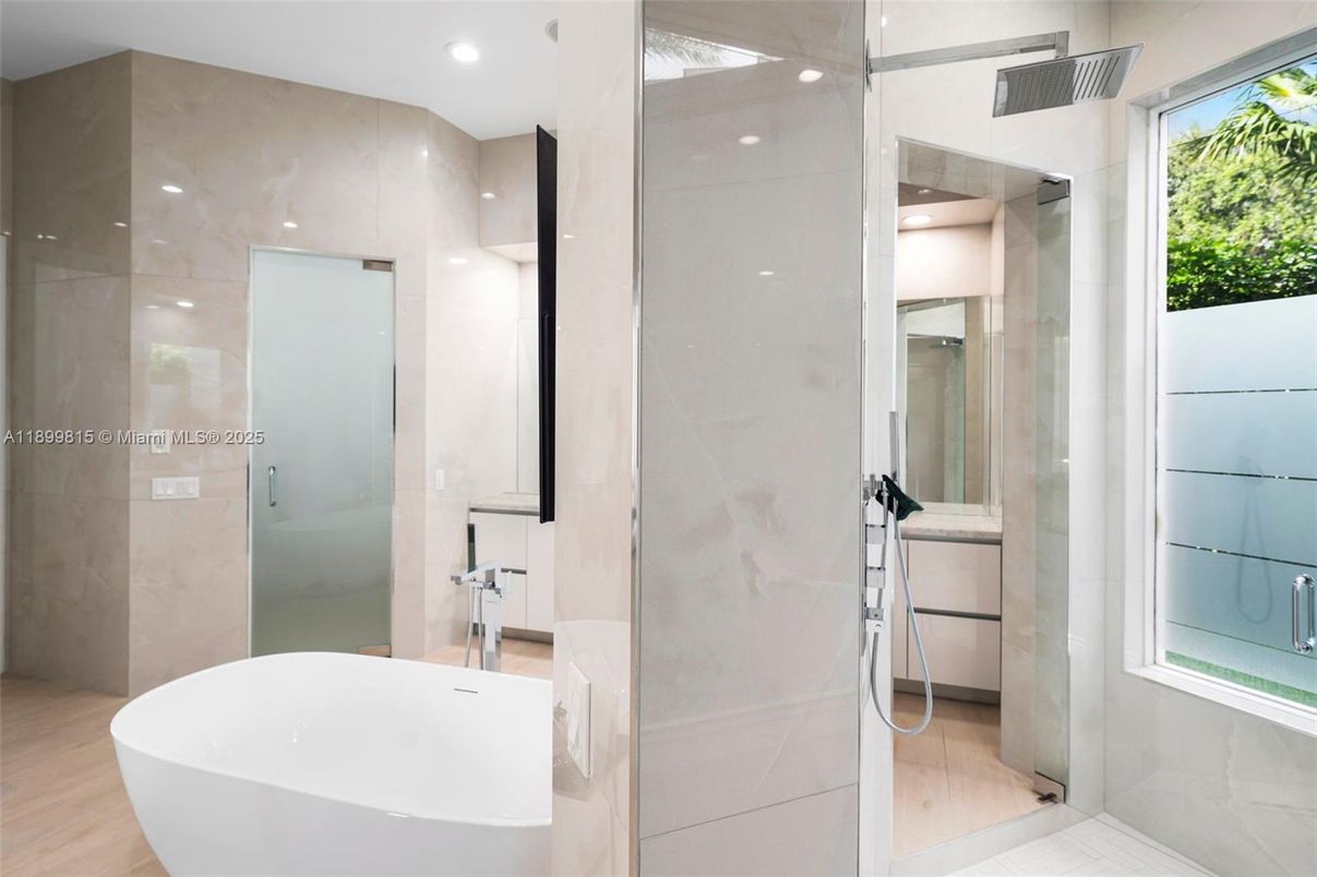 Bathroom, Free Standing Baths, Glass Shower, Interior, Recessed Lighting, Wood Texture Flooring