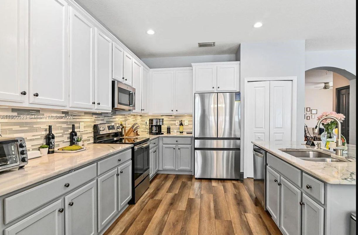 Interior, Kitchen, Recessed Lighting, Stainless Steel Appliances, Wood Texture Flooring