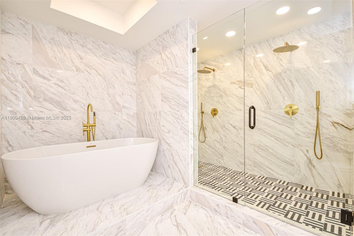 Bathroom, Free Standing Baths, Glass Shower, Interior, Marble, Marble Walls, Recessed Lighting