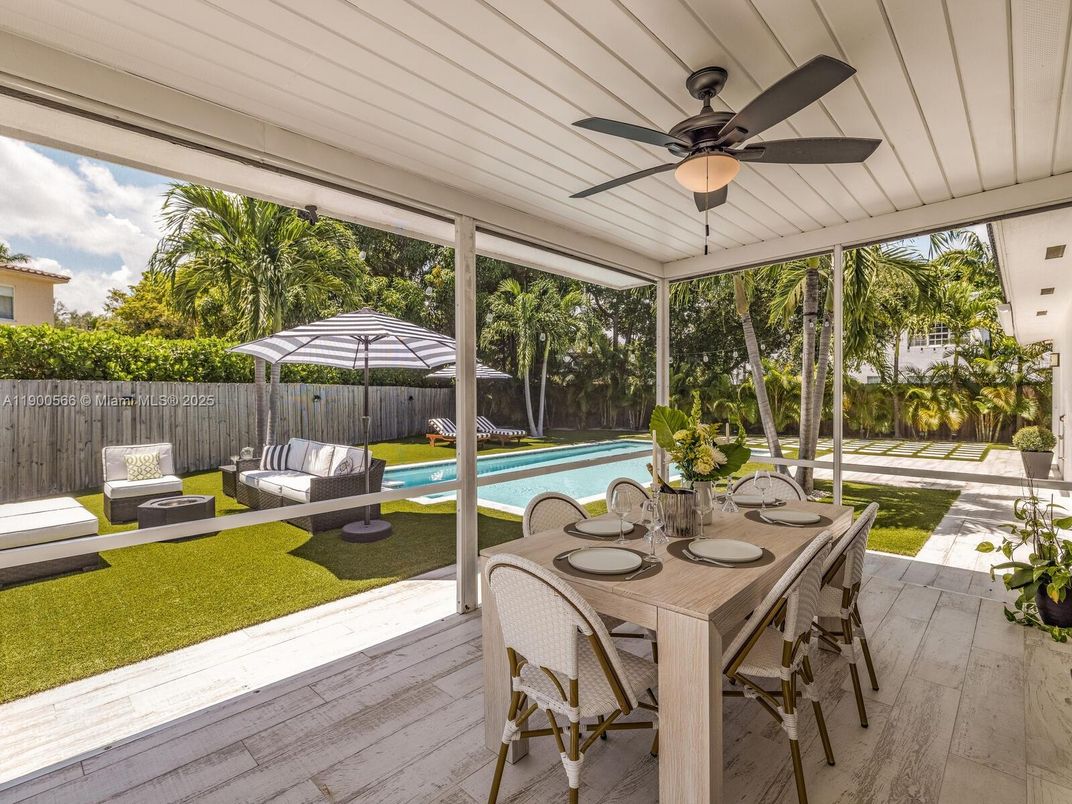 Dining room, Interior, Pool, Sun Room, Wood Texture Flooring