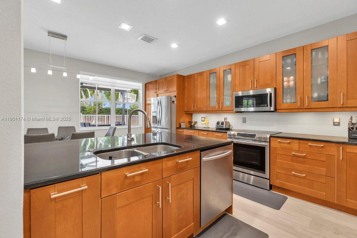 Interior, Kitchen, Pendant Lights, Recessed Lighting, Stainless Steel Appliances, Wood Texture Flooring