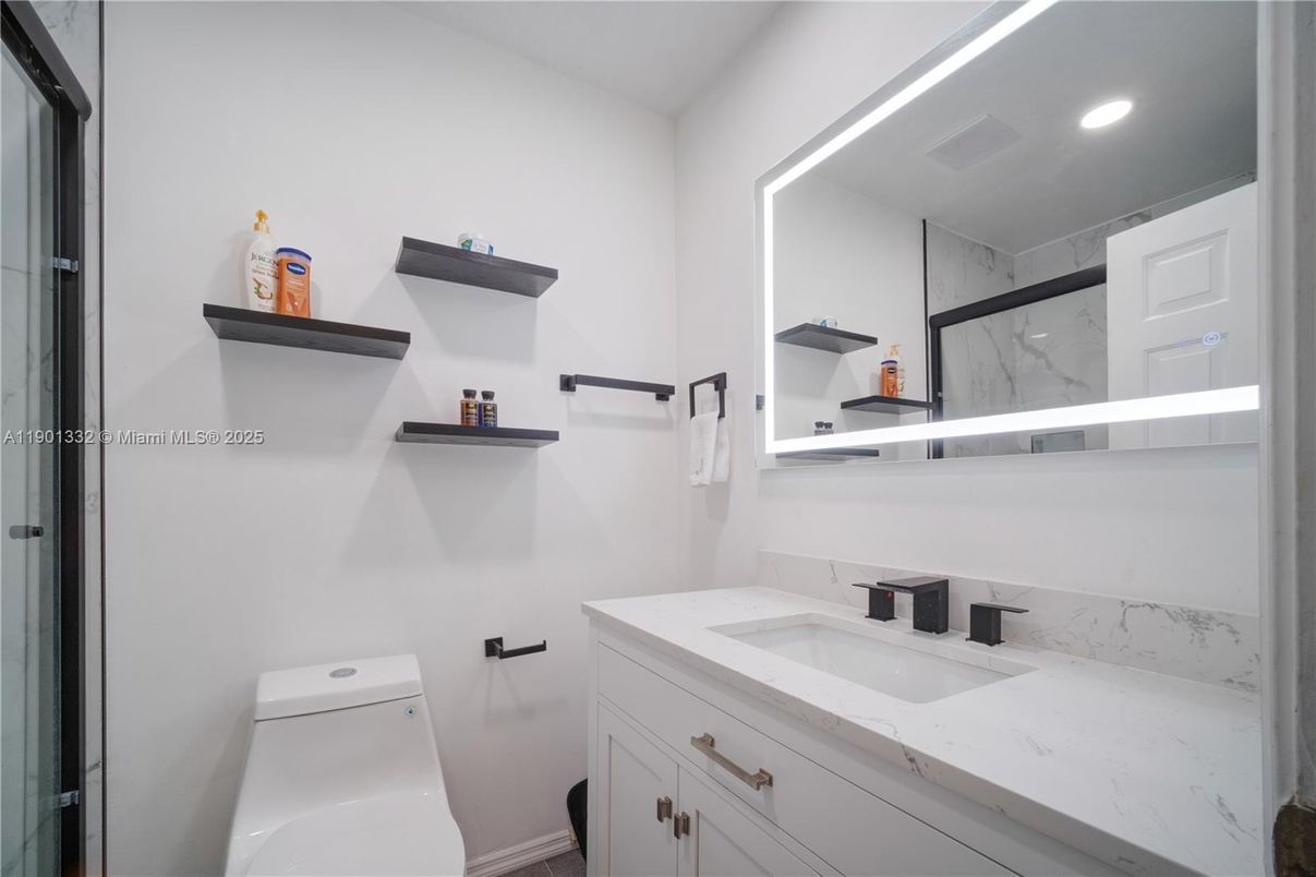 Bathroom, Dual Sink Vanities, Interior, Marble Walls, Recessed Lighting