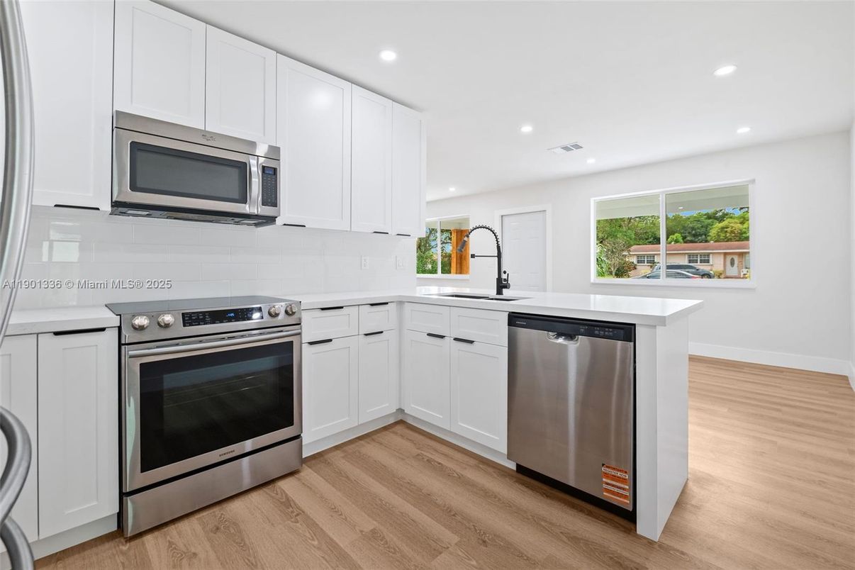 Interior, Kitchen, Recessed Lighting, Stainless Steel Appliances, Wood Texture Flooring