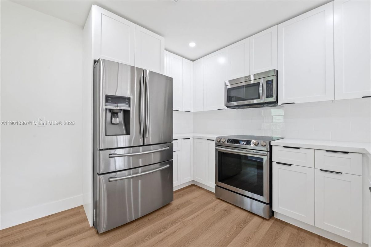 Interior, Kitchen, Recessed Lighting, Stainless Steel Appliances, Wood Texture Flooring