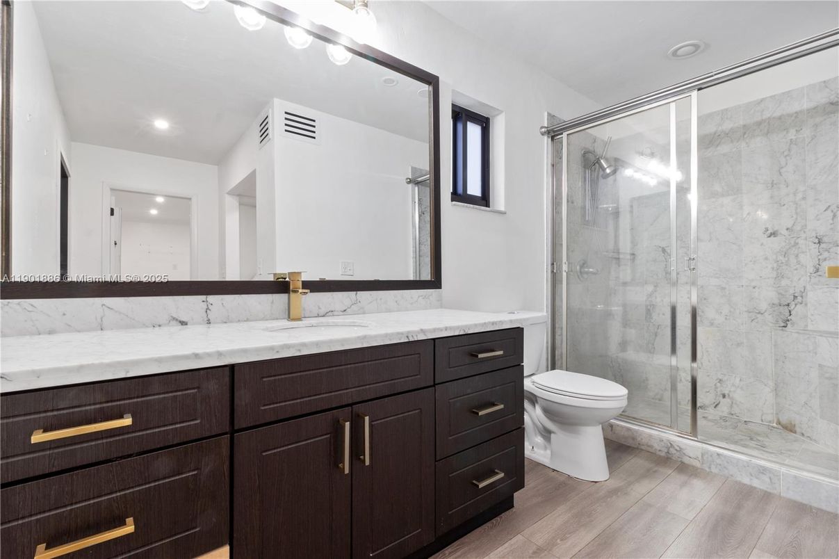 Bathroom, Glass Shower, Interior, Marble Walls, Recessed Lighting, Wood Texture Flooring