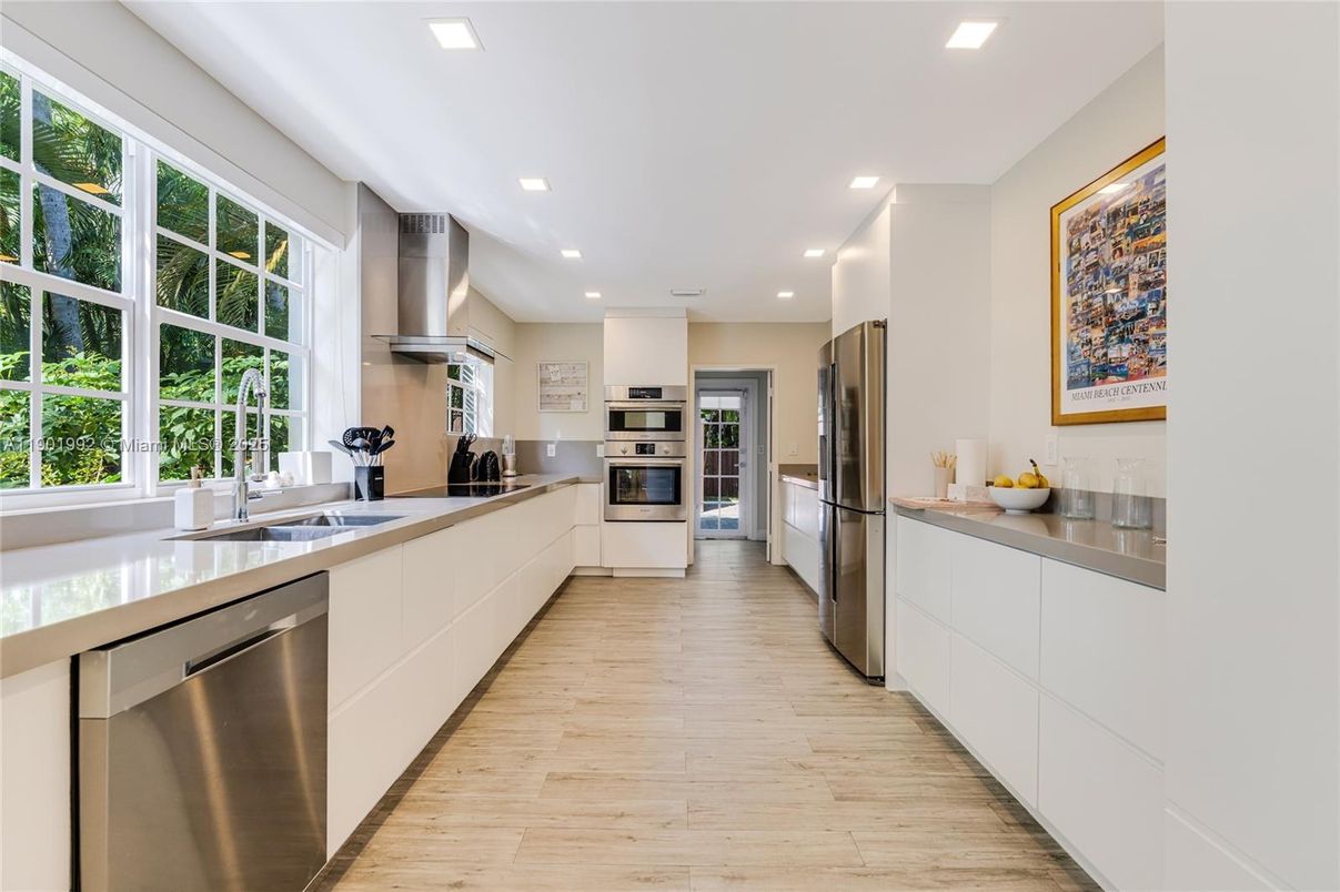 Interior, Kitchen, Recessed Lighting, Stainless Steel Appliances, Wood Texture Flooring