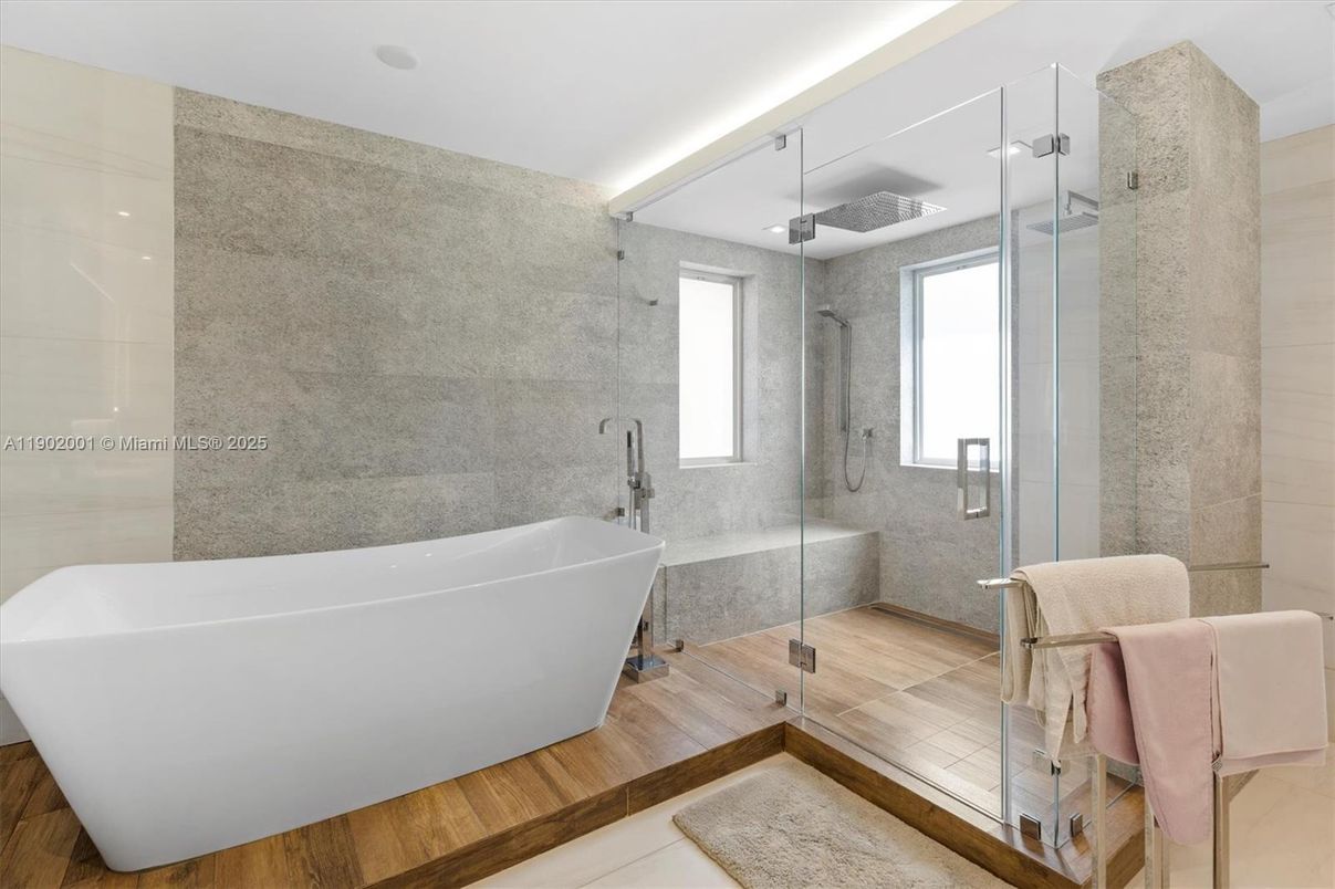 Bathroom, Free Standing Baths, Glass Shower, Interior, Marble Walls, Wood Texture Flooring