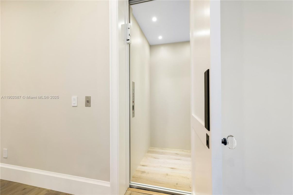 Elevator, Interior, Recessed Lighting, Wood Texture Flooring