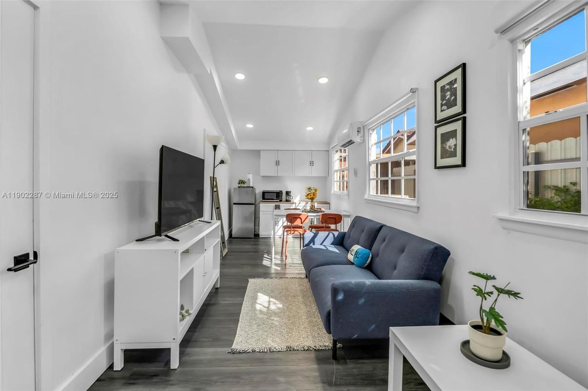 Dining room, Interior, Kitchen, Living room, Recessed Lighting, Stainless Steel Appliances, Wood Texture Flooring