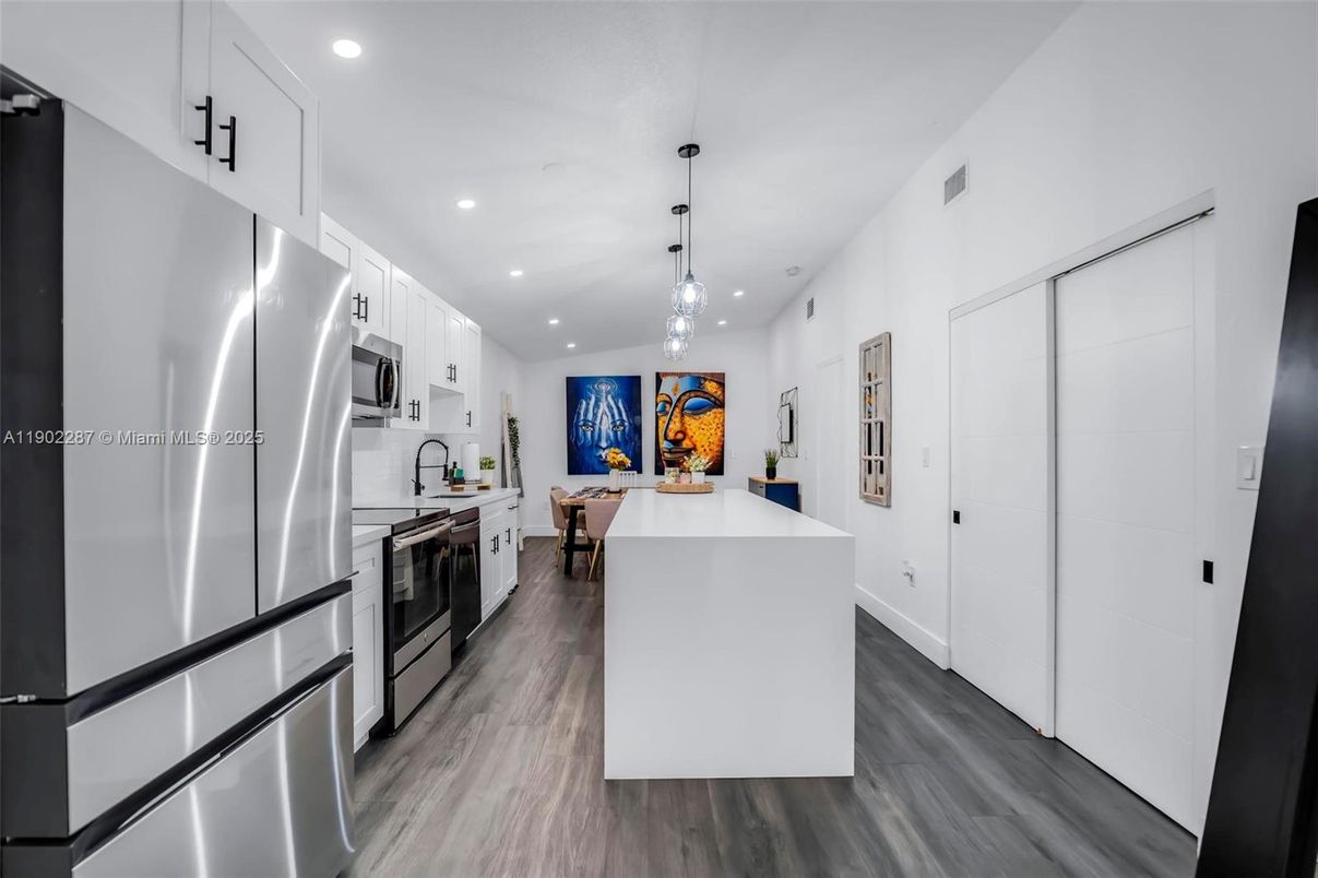 Interior, Kitchen, Pendant Lights, Recessed Lighting, Stainless Steel Appliances, Wood Texture Flooring