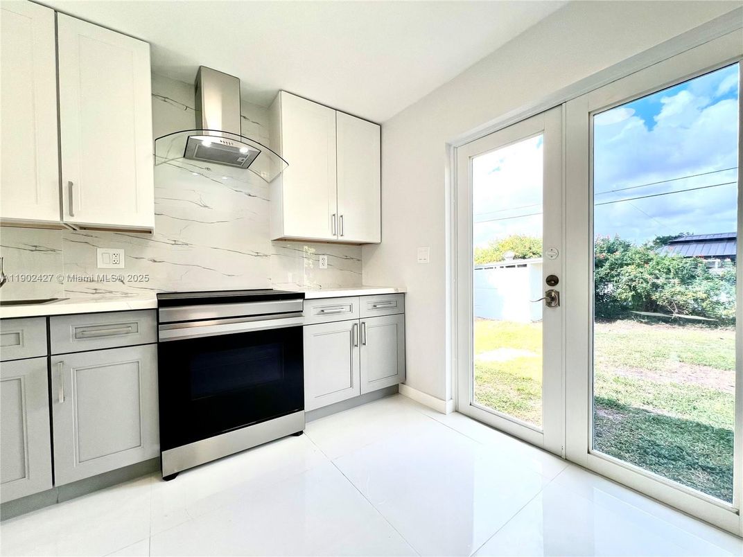 Interior, Kitchen, Marble Walls, Stainless Steel Appliances