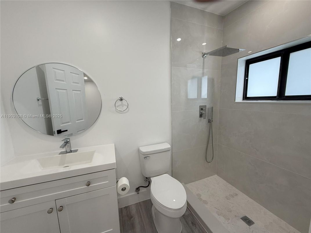 Bathroom, Glass Shower, Interior, Recessed Lighting, Wood Texture Flooring