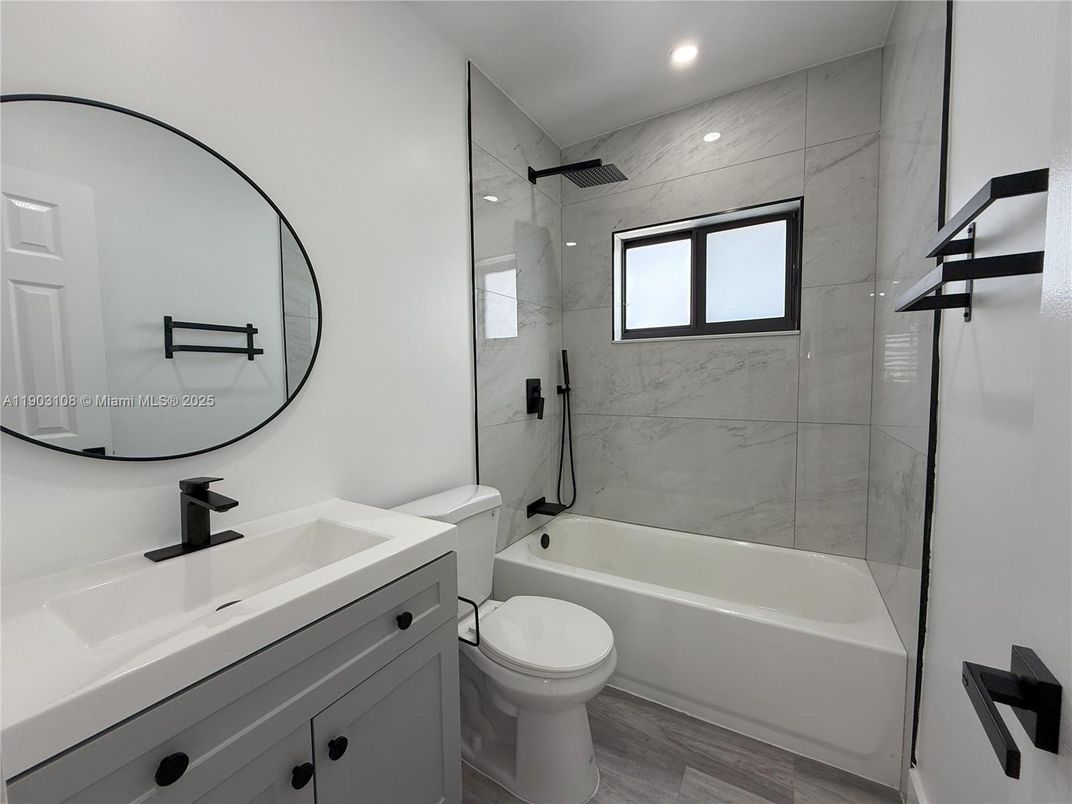 Bathroom, Glass Shower, Interior, Marble Walls, Recessed Lighting, Wood Texture Flooring