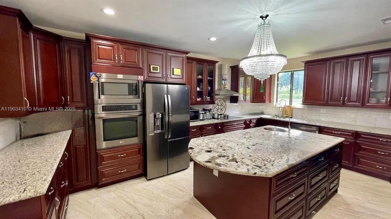 Chandelier, Interior, Kitchen, Recessed Lighting, Stainless Steel Appliances, Wood Texture Flooring