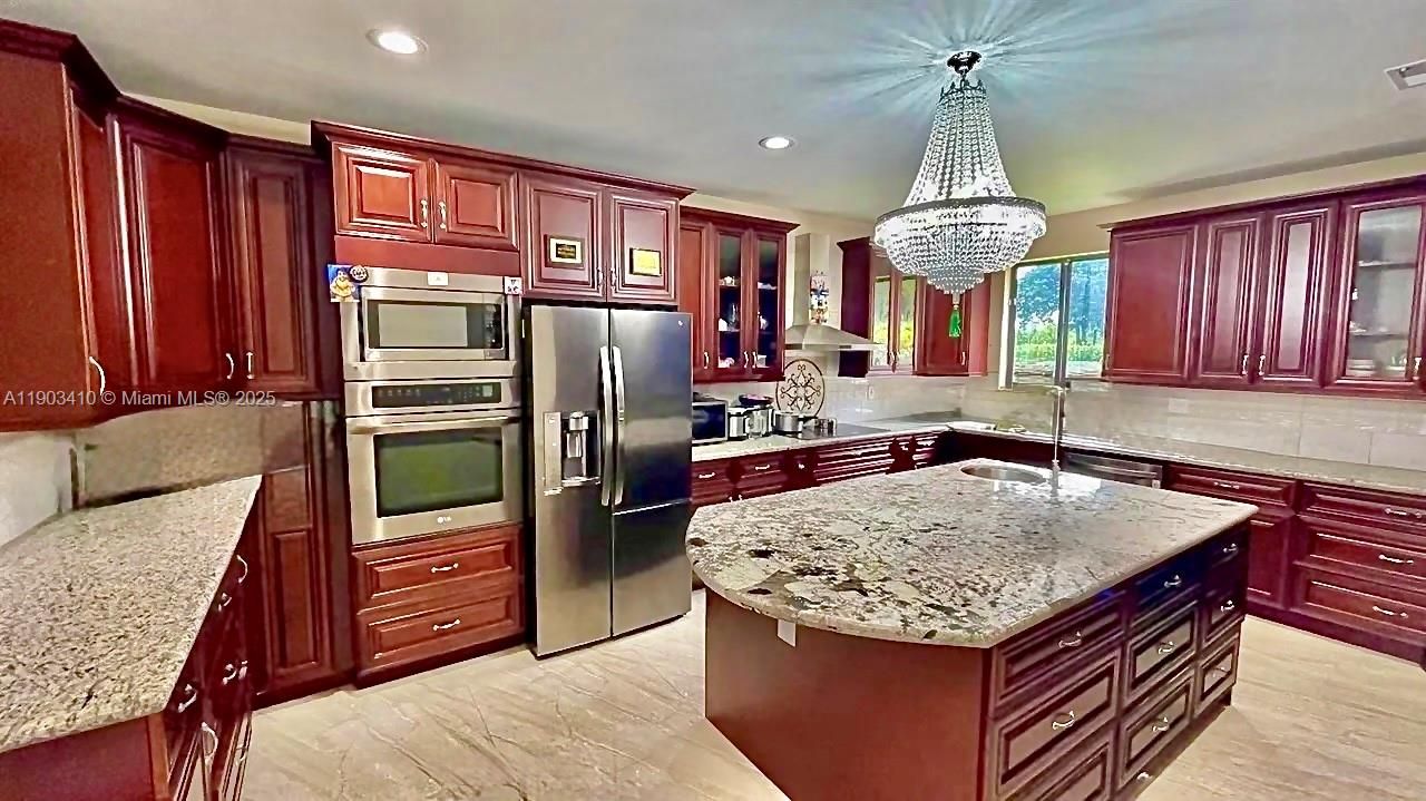 Chandelier, Interior, Kitchen, Pendant Lights, Recessed Lighting, Stainless Steel Appliances, Wood Texture Flooring