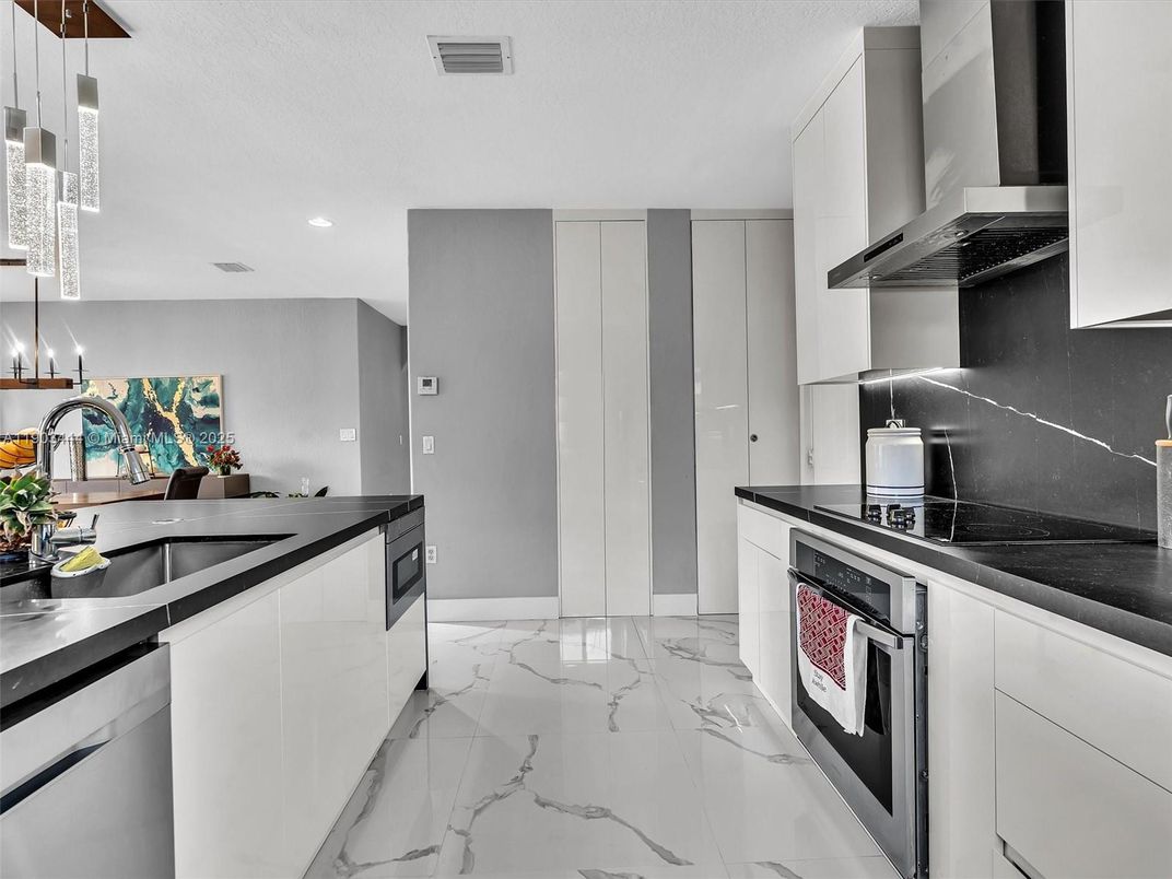 Interior, Kitchen, Marble, Pendant Lights, Recessed Lighting, Stainless Steel Appliances