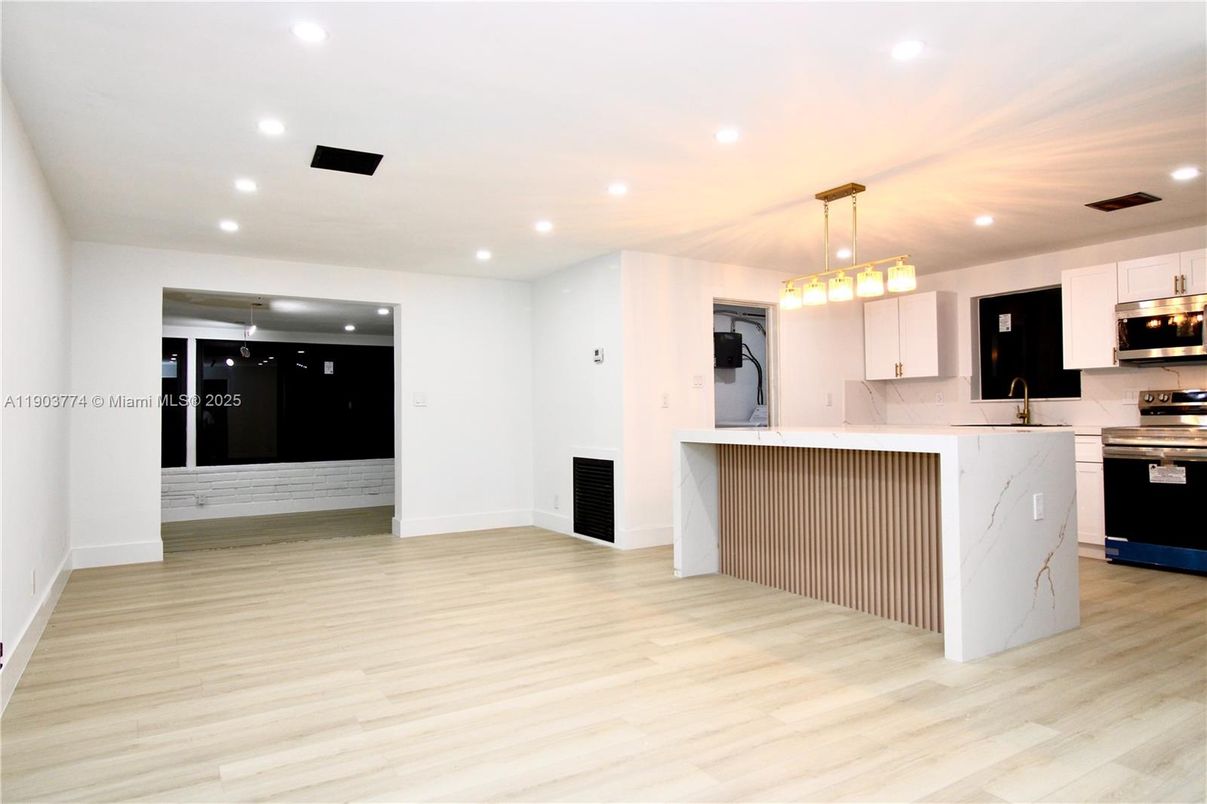 Interior, Kitchen, Pendant Lights, Recessed Lighting, Stainless Steel Appliances, Wood Texture Flooring