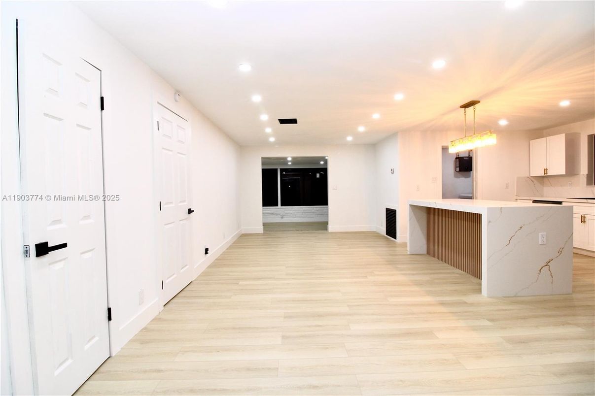 Interior, Kitchen, Marble Walls, Pendant Lights, Recessed Lighting, Wood Texture Flooring