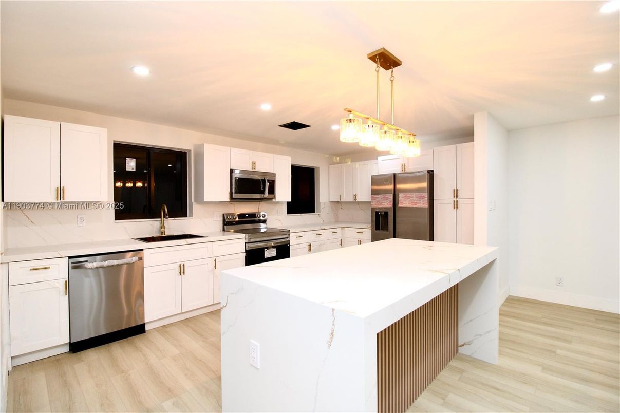 Interior, Kitchen, Pendant Lights, Recessed Lighting, Stainless Steel Appliances, Wood Texture Flooring