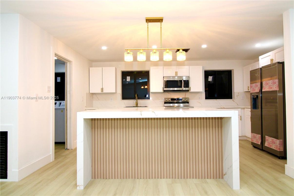 Interior, Kitchen, Pendant Lights, Recessed Lighting, Stainless Steel Appliances, Wood Texture Flooring