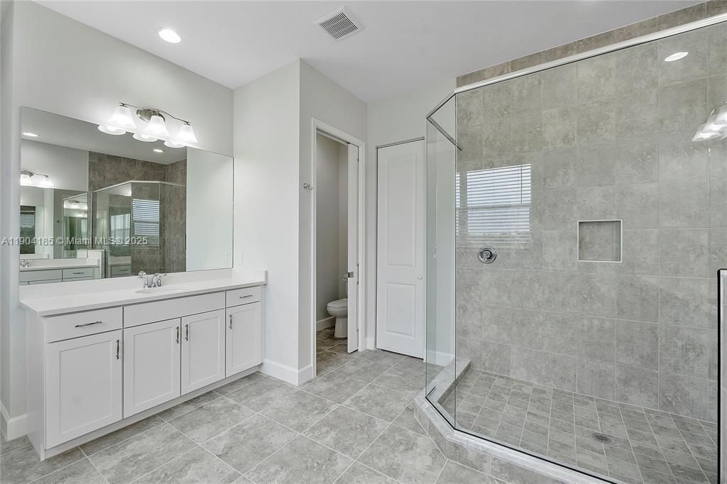 Bathroom, Dual Sink Vanities, Glass Shower, Interior, Recessed Lighting