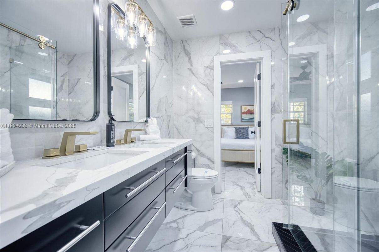 Bathroom, Bedroom, Dual Sink Vanities, Glass Shower, Interior, Marble, Marble Walls, Recessed Lighting