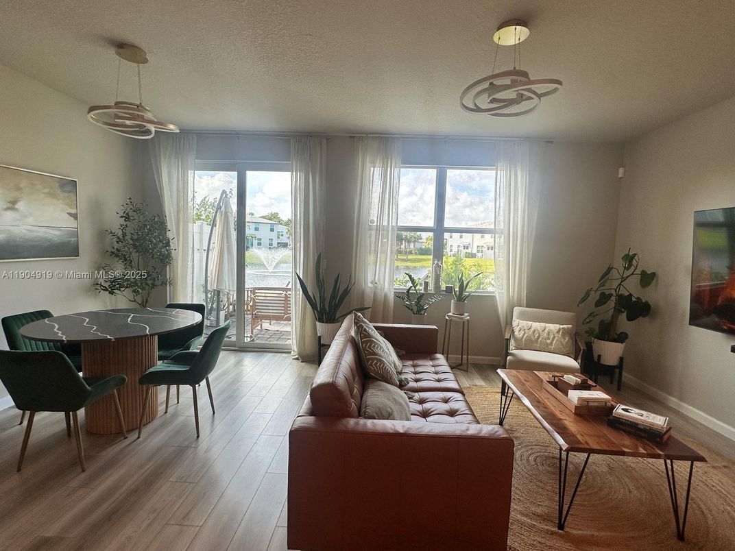 Dining room, Interior, Living room, Pendant Lights, Wood Texture Flooring