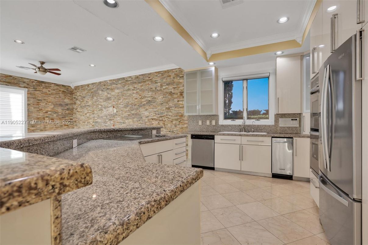 Interior, Kitchen, Recessed Lighting, Stainless Steel Appliances, Stone Walls