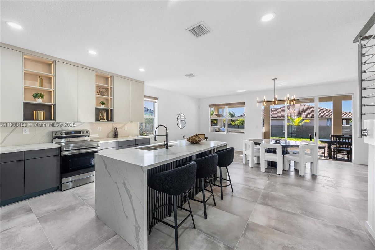 Chandelier, Dining room, Interior, Kitchen, Pendant Lights, Recessed Lighting, Stainless Steel Appliances
