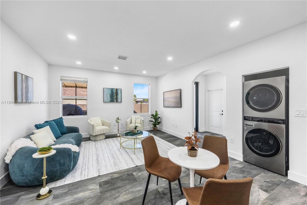 Interior, Living room, Recessed Lighting, Utility Closets, Washer, Wood Texture Flooring