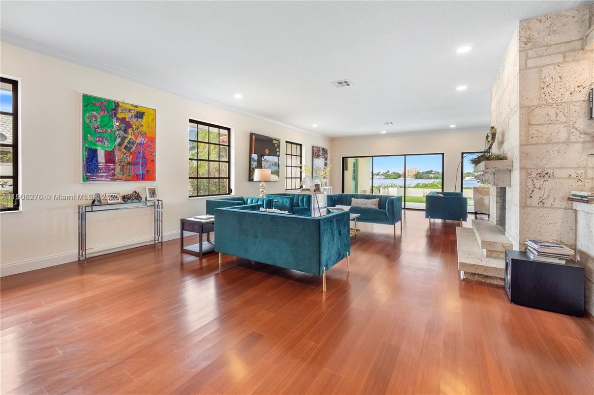 Fireplace, Interior, Living room, Recessed Lighting, Stone Walls, Wood Texture Flooring