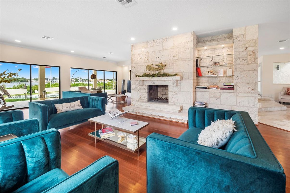 Fireplace, Interior, Living room, Recessed Lighting, Stone Walls, Wood Texture Flooring