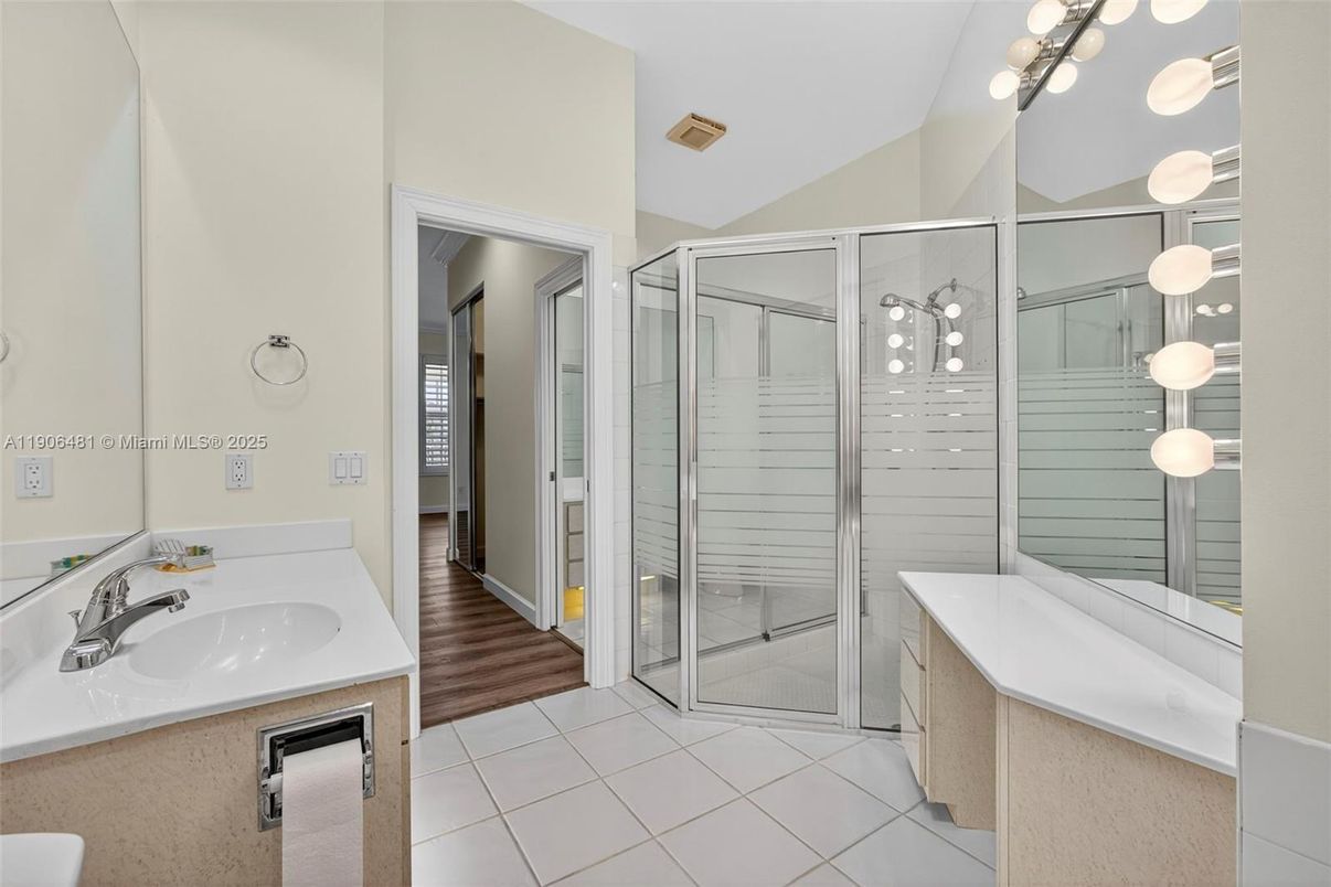Bathroom, Dual Sink Vanities, Glass Shower, Interior, Wood Texture Flooring