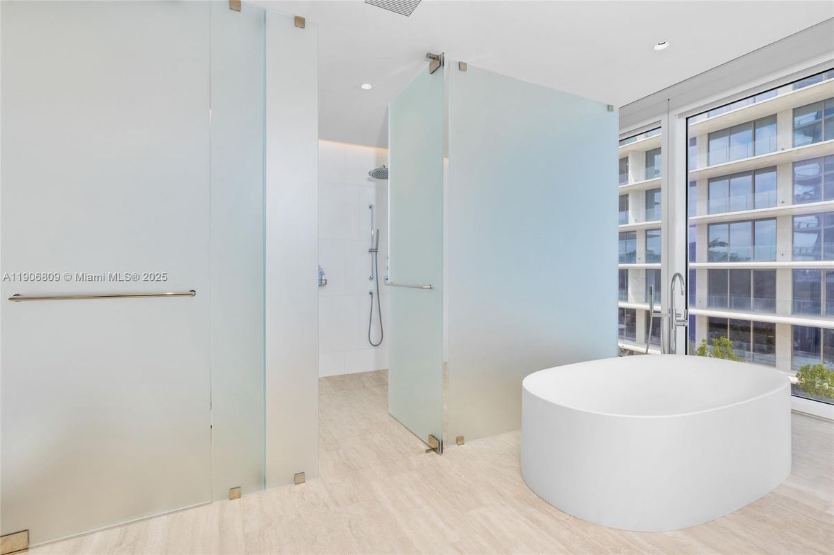 Bathroom, Free Standing Baths, Glass Shower, Interior, Recessed Lighting, Wood Texture Flooring