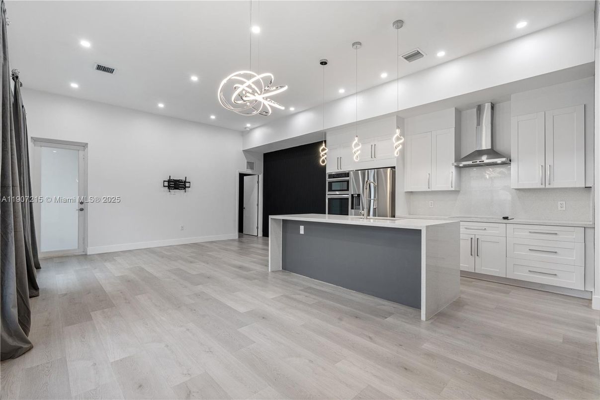 Interior, Kitchen, Pendant Lights, Recessed Lighting, Stainless Steel Appliances, Wood Texture Flooring