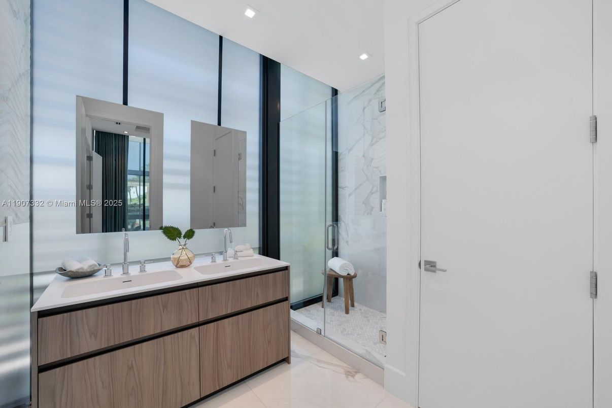 Bathroom, Dual Sink Vanities, Glass Shower, Interior, Marble Walls, Recessed Lighting