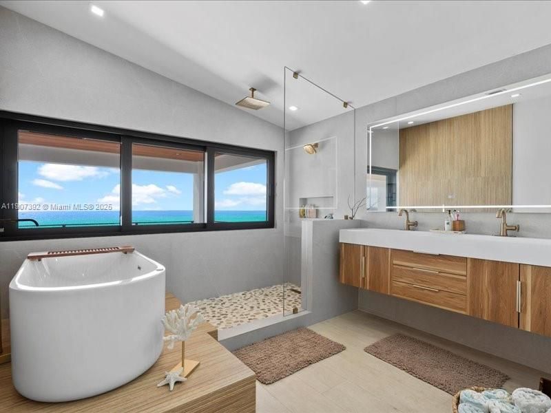 Bathroom, Free Standing Baths, Interior, Recessed Lighting, Water, Wood Texture Flooring