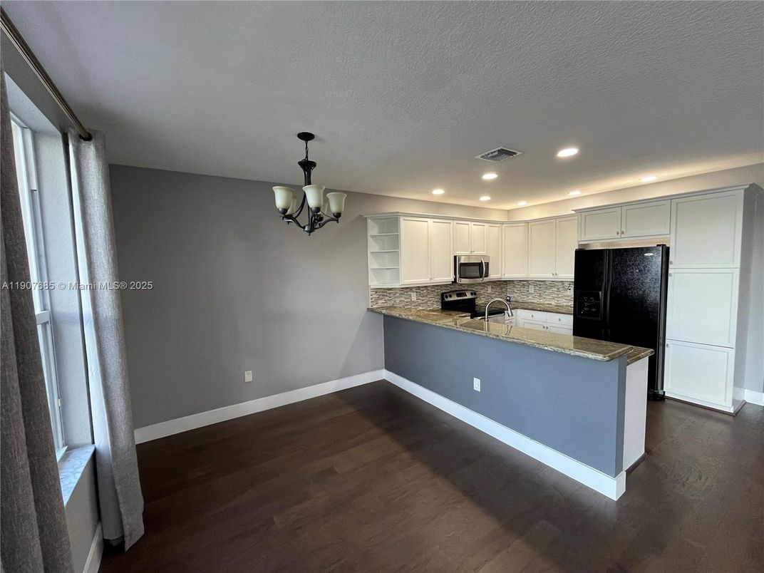 Chandelier, Interior, Kitchen, Recessed Lighting, Stainless Steel Appliances, Wood Texture Flooring