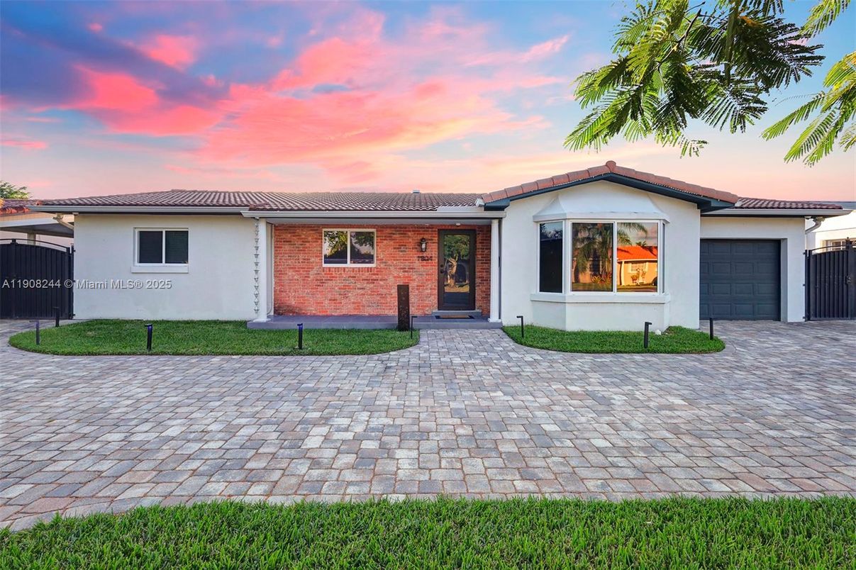 Attached, Exterior, Facade, Brick Facade, Spanish Mediterranean