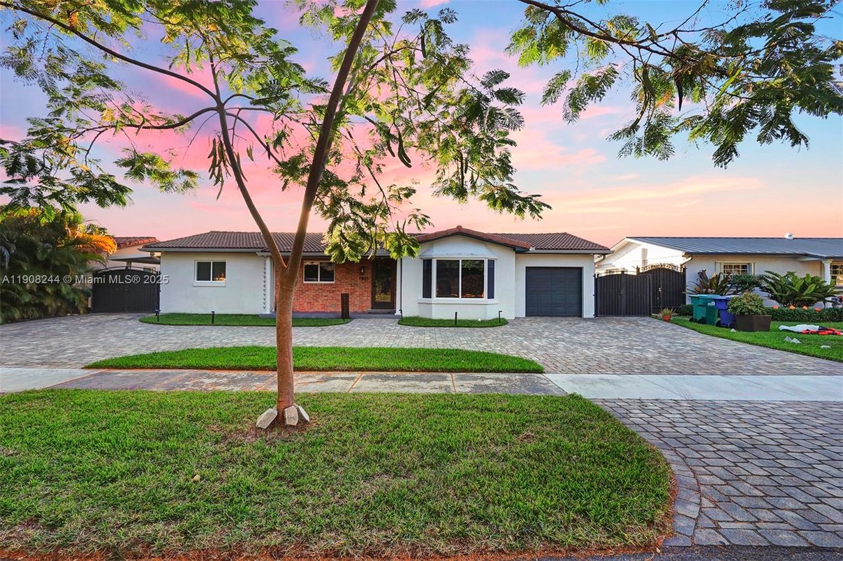 Attached, Backyard, Exterior, Facade, Brick Facade, Ranch