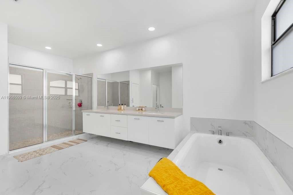 Bathroom, Dual Sink Vanities, Glass Shower, Interior, Marble, Recessed Lighting