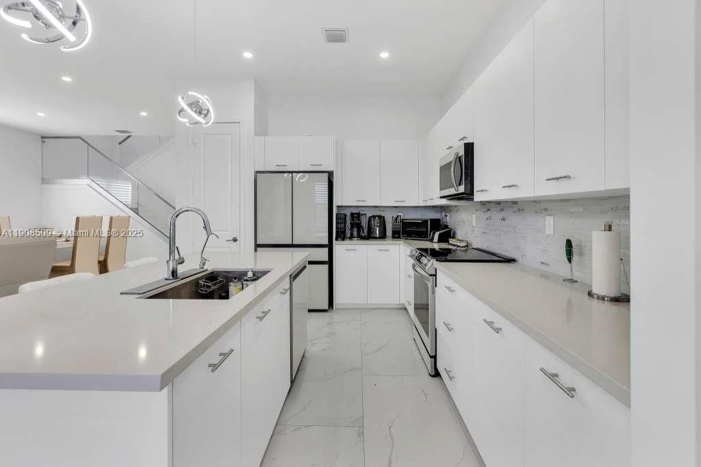 Interior, Kitchen, Marble, Pendant Lights, Recessed Lighting, Stainless Steel Appliances