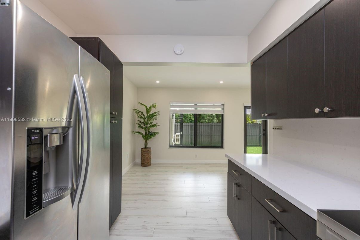 Interior, Kitchen, Marble, Recessed Lighting, Stainless Steel Appliances, Wood Texture Flooring