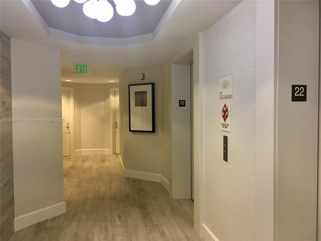 Elevator, Interior, Recessed Lighting, Wood Texture Flooring