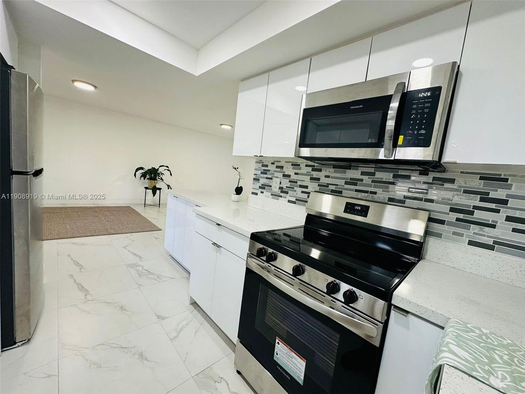 Interior, Kitchen, Marble, Recessed Lighting, Stainless Steel Appliances