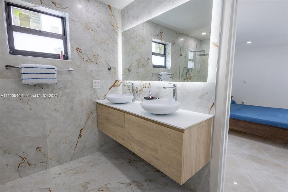 Bathroom, Dual Sink Vanities, Interior, Marble Walls, Recessed Lighting