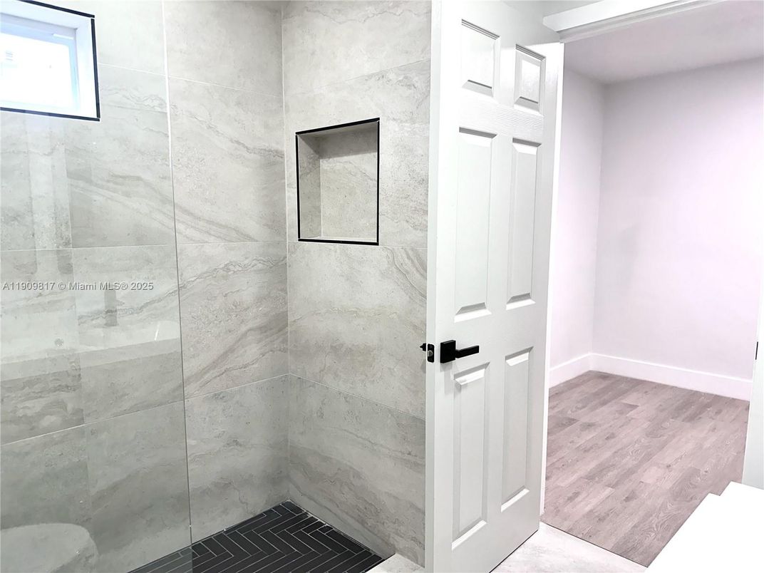 Bathroom, Glass Shower, Interior, Marble Walls, Wood Texture Flooring