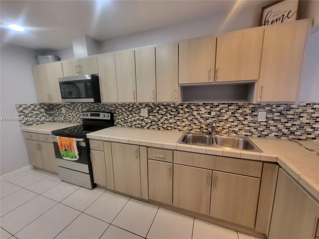 Interior, Kitchen, Recessed Lighting, Tile Countertops